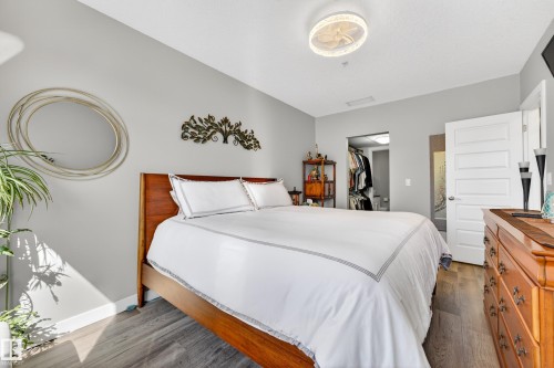 109 5151 Windermere Boulevard, Edmonton, AB - Indoor Photo Showing Bedroom
