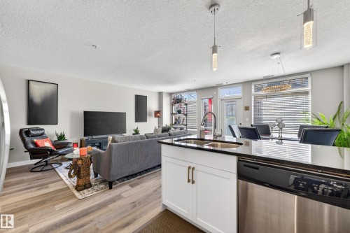 109 5151 Windermere Boulevard, Edmonton, AB - Indoor Photo Showing Kitchen With Double Sink