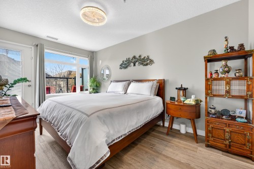 109 5151 Windermere Boulevard, Edmonton, AB - Indoor Photo Showing Bedroom