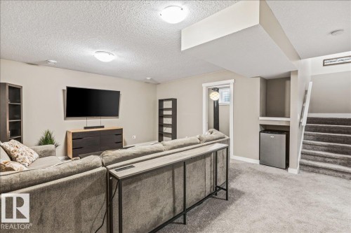 2108 77 Street, Edmonton, AB - Indoor Photo Showing Living Room