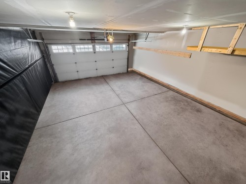 15 Spring Link, Spruce Grove, AB - Indoor Photo Showing Garage