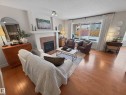 15 Spring Link, Spruce Grove, AB  - Indoor Photo Showing Living Room With Fireplace 