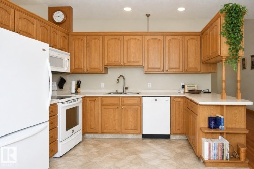 103 Lakeside Place, Leduc, AB - Indoor Photo Showing Kitchen With Double Sink