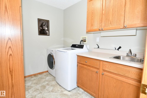 103 Lakeside Place, Leduc, AB - Indoor Photo Showing Laundry Room