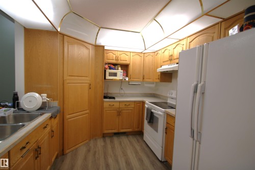 4834 49 Ave, St. Paul Town, AB - Indoor Photo Showing Kitchen With Double Sink
