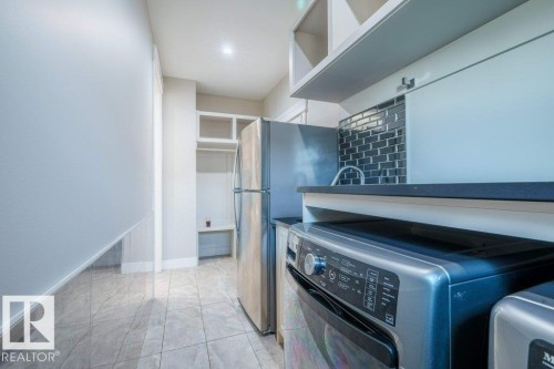 4408 39 Street, Beaumont, AB - Indoor Photo Showing Laundry Room