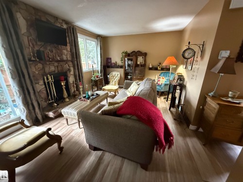 18525 66 Avenue, Edmonton, AB - Indoor Photo Showing Living Room With Fireplace