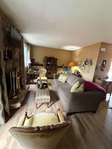 18525 66 Avenue, Edmonton, AB - Indoor Photo Showing Living Room With Fireplace