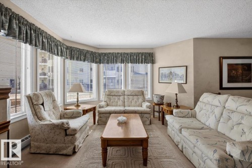 105 5212 25 Avenue Nw, Edmonton, AB - Indoor Photo Showing Living Room