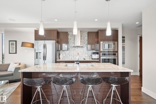 1901 11969 Jasper Avenue, Edmonton, AB - Indoor Photo Showing Kitchen With Stainless Steel Kitchen With Double Sink With Upgraded Kitchen