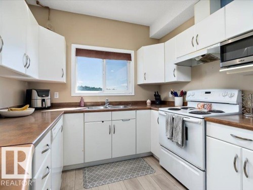 408 304 Lewis Estates Boulevard, Edmonton, AB - Indoor Photo Showing Kitchen With Double Sink