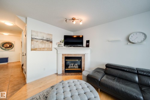 3716 160A Avenue, Edmonton, AB - Indoor Photo Showing Living Room With Fireplace