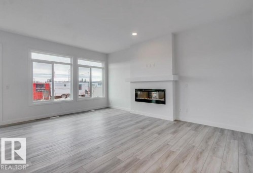 3780 Erlanger Drive, Edmonton, AB - Indoor Photo Showing Living Room With Fireplace