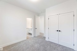 Light gray carpeting and white walls - 