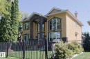 Stucco exterior with stone accents and arched entry - 10731 150 Street Nw, Edmonton, AB  - Outdoor 