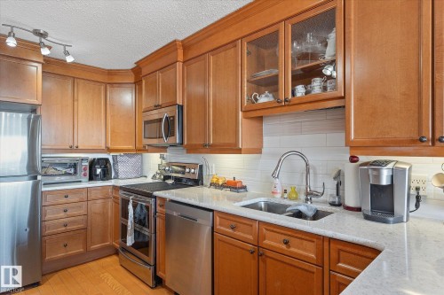 1002 9923 103 Street, Edmonton, AB - Indoor Photo Showing Kitchen With Double Sink