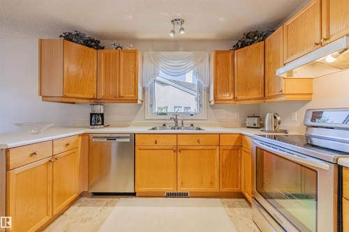 128 215 Blackburn East Drive, Edmonton, AB - Indoor Photo Showing Kitchen With Double Sink