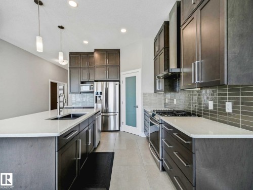 7515 173 Avenue, Edmonton, AB - Indoor Photo Showing Kitchen With Double Sink With Upgraded Kitchen