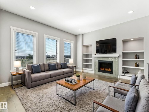 7515 173 Avenue, Edmonton, AB - Indoor Photo Showing Living Room With Fireplace