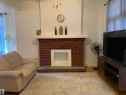 11305 89 Street, Edmonton, AB  - Indoor Photo Showing Living Room With Fireplace 