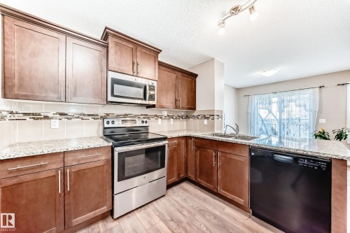 17304 73 Street, Edmonton, AB - Indoor Photo Showing Kitchen With Double Sink