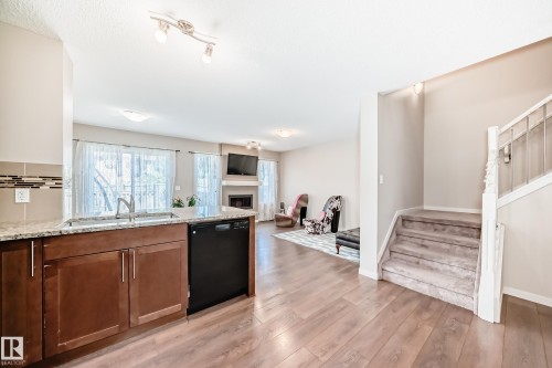 17304 73 Street, Edmonton, AB - Indoor Photo Showing Kitchen With Fireplace