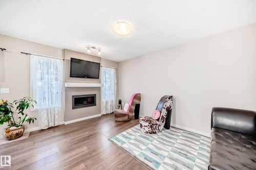 17304 73 Street, Edmonton, AB - Indoor Photo Showing Living Room With Fireplace
