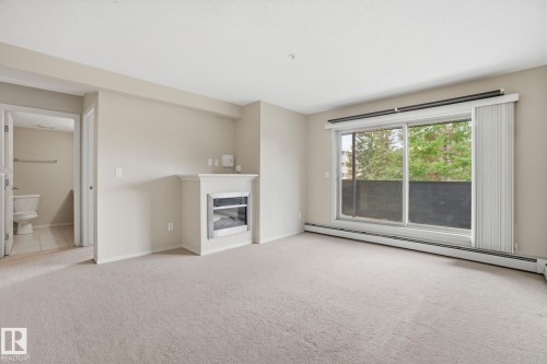 214 17011 67 Avenue, Edmonton, AB - Indoor With Fireplace