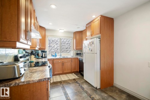 10649 67 Avenue, Edmonton, AB - Indoor Photo Showing Kitchen With Double Sink
