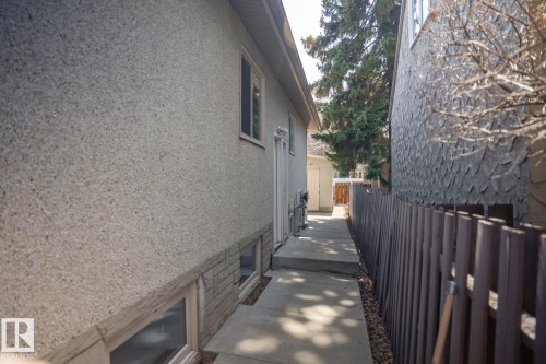 Both units have a separate side entrances. Main floor unit has 2 entrances, as does basement. - 10649 67 Avenue, Edmonton, AB - Outdoor