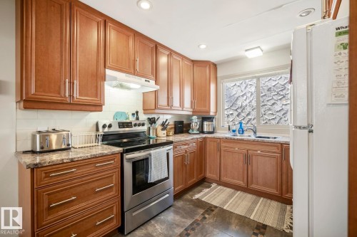 Main floor kitchen. - 10649 67 Avenue, Edmonton, AB - Indoor Photo Showing Kitchen With Double Sink