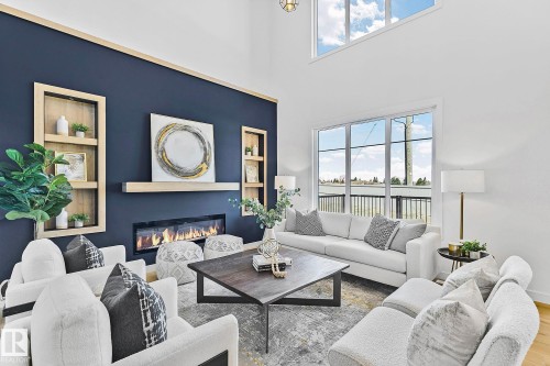 161 Graybriar Drive, Stony Plain, AB - Indoor Photo Showing Living Room With Fireplace