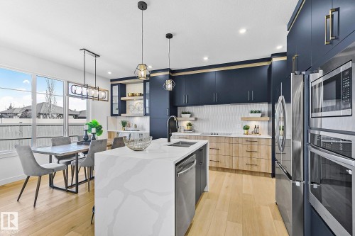 161 Graybriar Drive, Stony Plain, AB - Indoor Photo Showing Kitchen With Double Sink With Upgraded Kitchen