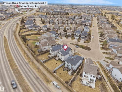 Aerial perspective of a residential neighborhood featuring detached properties with fenced backyards - 7407 Singer Landing Landing, Edmonton, AB - Outdoor With View
