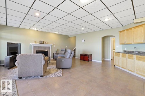 72 Beach Ave, Rural Leduc County, AB - Indoor With Fireplace