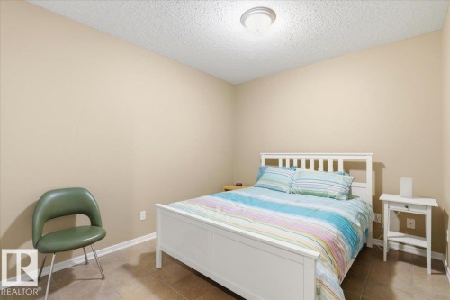72 Beach Ave, Rural Leduc County, AB - Indoor Photo Showing Bedroom