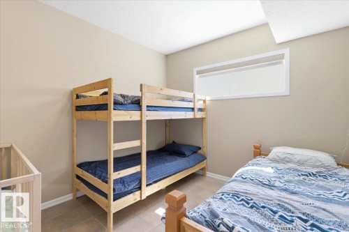 72 Beach Ave, Rural Leduc County, AB - Indoor Photo Showing Bedroom