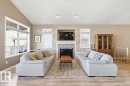 72 Beach Ave, Rural Leduc County, AB  - Indoor Photo Showing Living Room With Fireplace 