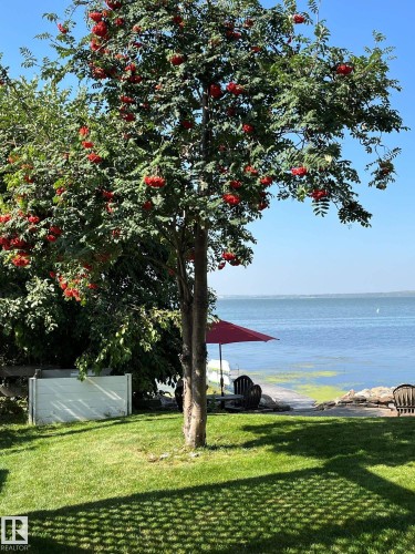 72 Beach Ave, Rural Leduc County, AB - Outdoor With Body Of Water