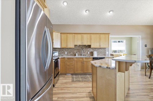 72 Beach Ave, Rural Leduc County, AB - Indoor Photo Showing Kitchen With Upgraded Kitchen