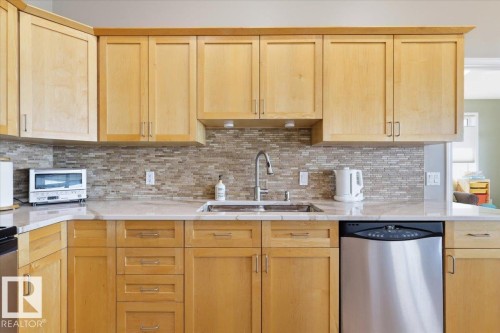 72 Beach Ave, Rural Leduc County, AB - Indoor Photo Showing Kitchen With Double Sink