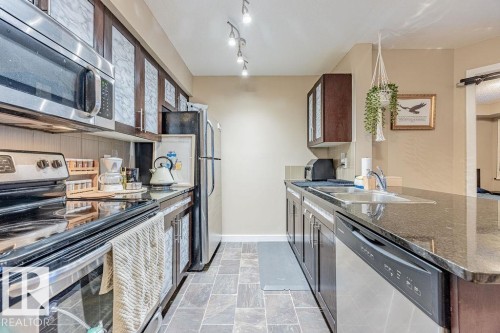 310 12025 22 Avenue, Edmonton, AB - Indoor Photo Showing Kitchen With Double Sink