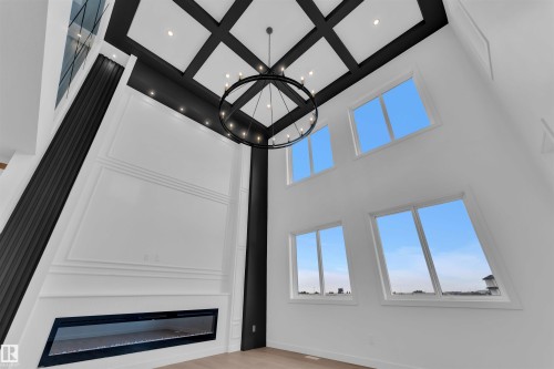 21 Axelwood Crescent, Spruce Grove, AB - Indoor Photo Showing Other Room With Fireplace