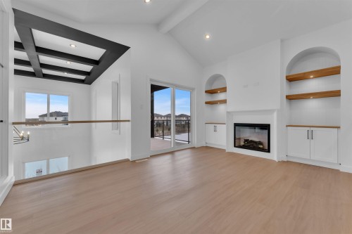 21 Axelwood Crescent, Spruce Grove, AB - Indoor Photo Showing Other Room With Fireplace