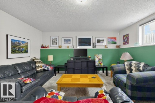 11686 15 Avenue, Edmonton, AB - Indoor Photo Showing Living Room