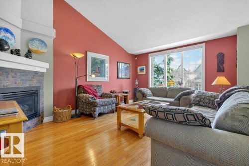 11686 15 Avenue, Edmonton, AB - Indoor Photo Showing Living Room With Fireplace
