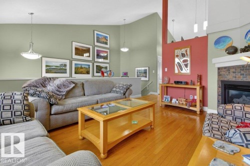 11686 15 Avenue, Edmonton, AB - Indoor Photo Showing Living Room With Fireplace