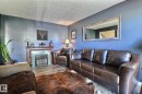 5315 39 Avenue, Edmonton, AB  - Indoor Photo Showing Living Room With Fireplace 