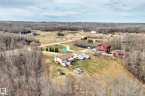 Two-story residence featuring a front gabled roof and light-colored siding - 8 54514 Rr12, Rural Lac Ste. Anne County, AB - Outdoor With View