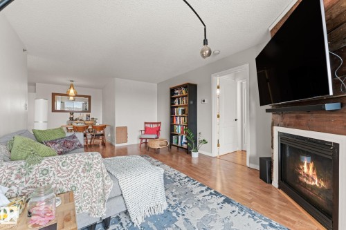 311 9640 105 Street, Edmonton, AB - Indoor With Fireplace